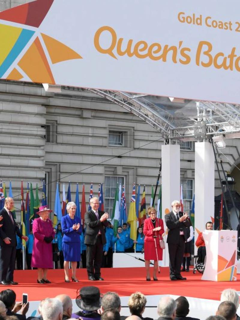 Retired cyclist Anna Mears from Australia carries the baton after receiving it from Queen Elizabeth during the launch of The Queen's Baton Relay for the XXI Commonwealth Games being held on the Gold Coast in 2018 at Buckingham Palace.