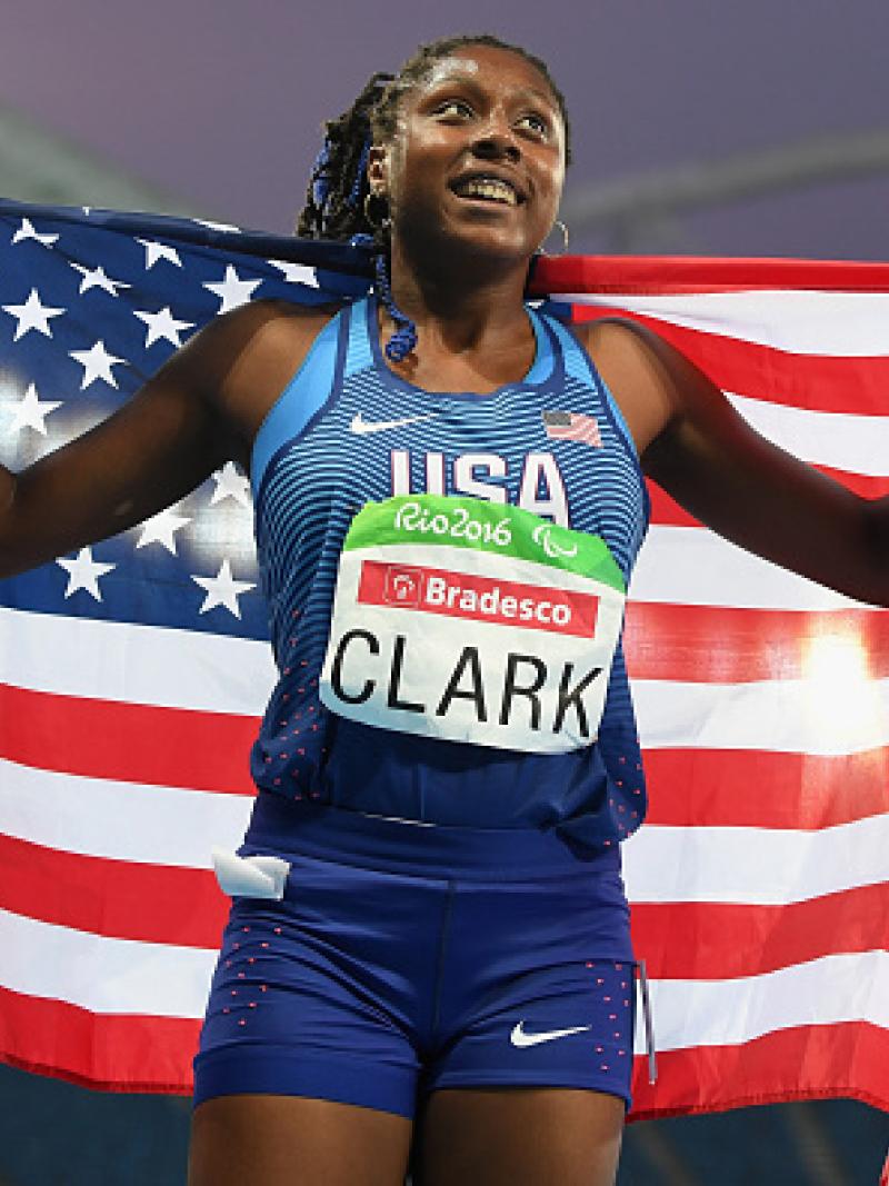 Breanna Clark of the United States celebrates winning the gold medal in the Women's 400m - T20 Final on day 6 of the Rio 2016 Paralympic Games