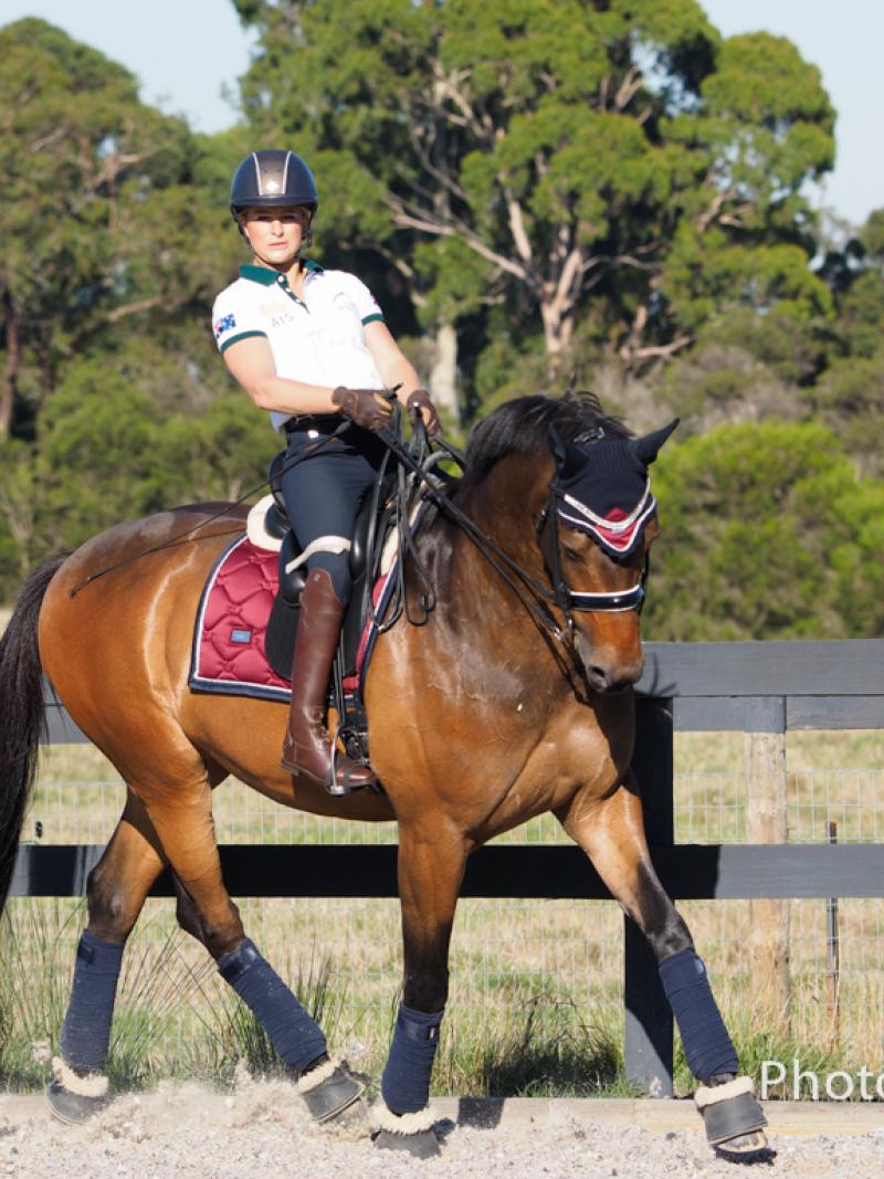 Woman riding a horse