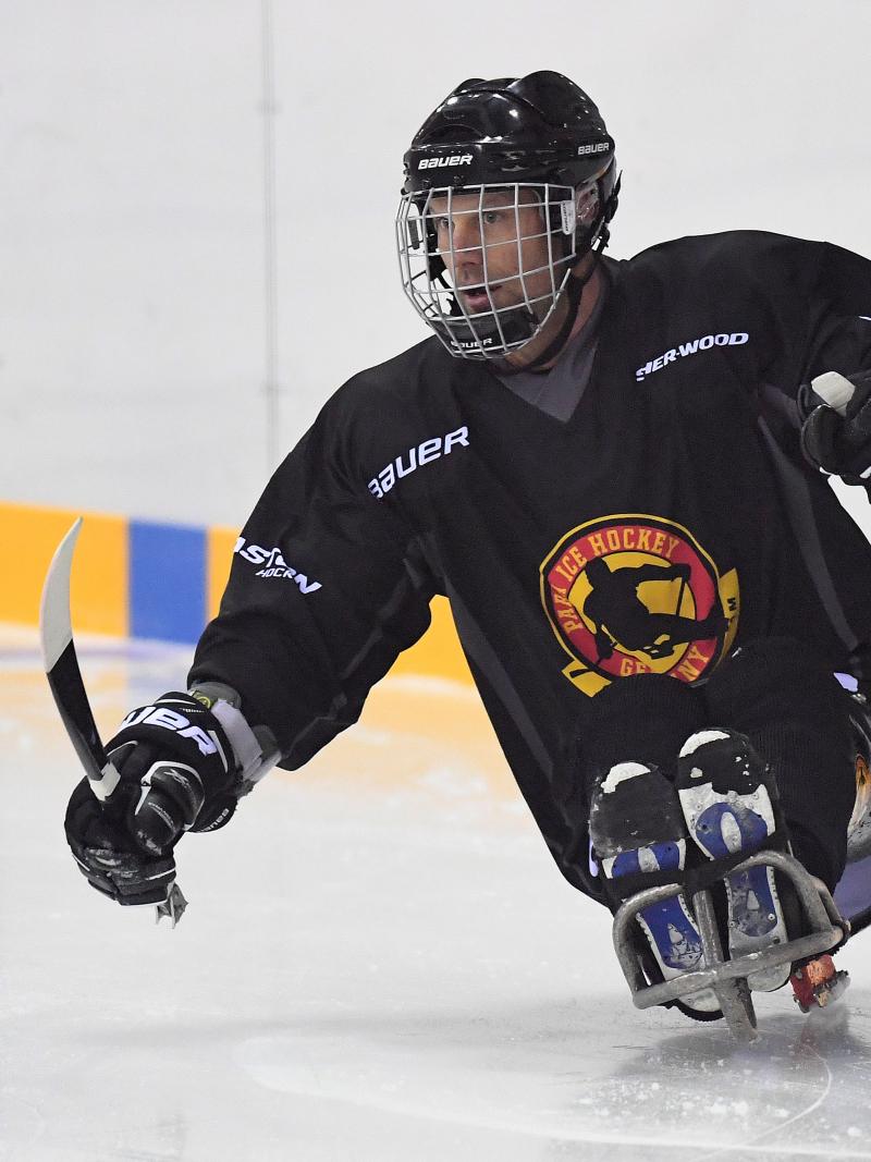 a Para ice hockey player on the ice