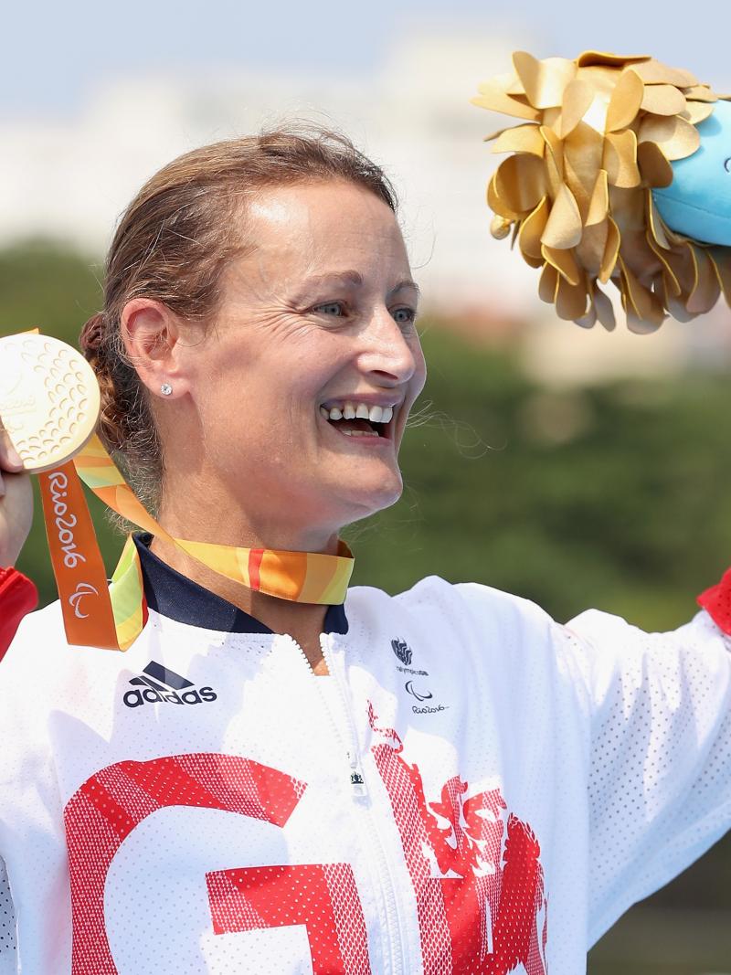 Great Britain's Anne Dickens celebrates on the medals podium after winning the women's KL3 canoe final at the Rio 2016 Paralympic Games.