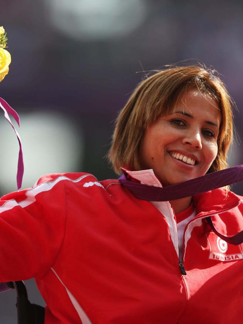 Tunisia's silver medallist Hania Aidi on the podium during the medal ceremony for the women's javelin F54/55/56 at the London 2012 Paralympic Games. 