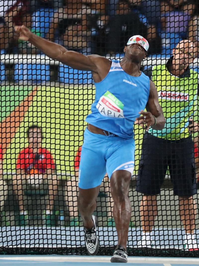 Italy's Oney Tapia competes in the discus F11 at the Rio 2016 Paralympic Games.