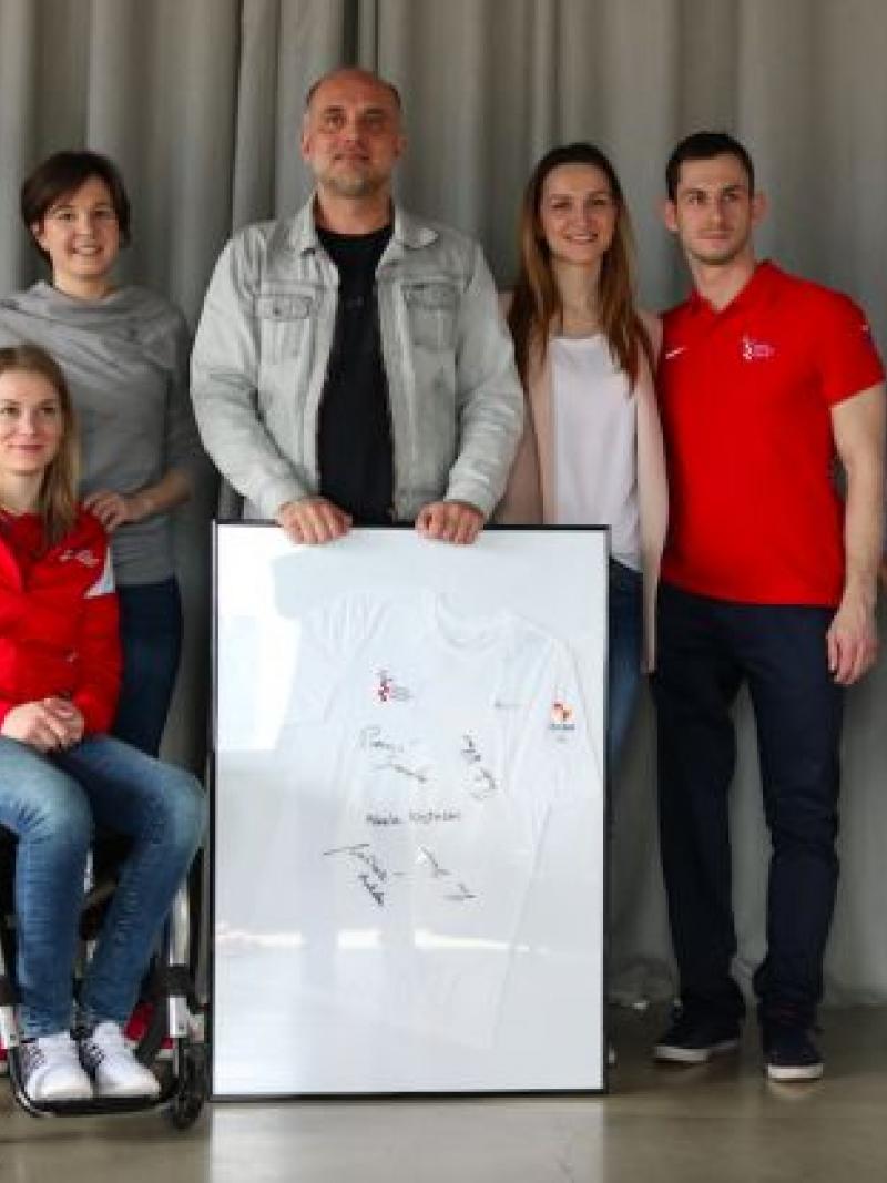 Group of people pose for a photo