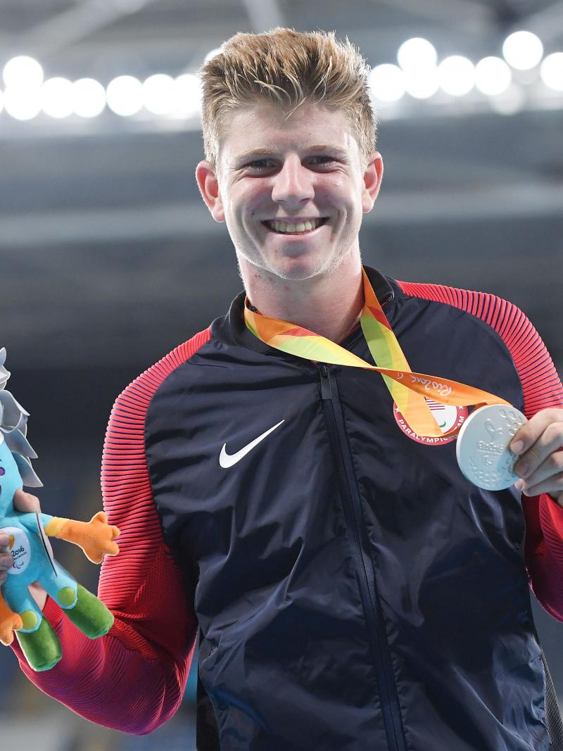 The USA's silver medallist Hunter Woodhall at the medal ceremony for the men's 200m T44 at the Rio 2016 Paralympic Games.