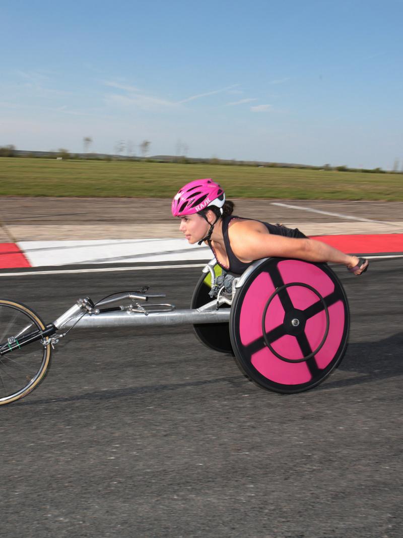 Woman in racing chair
