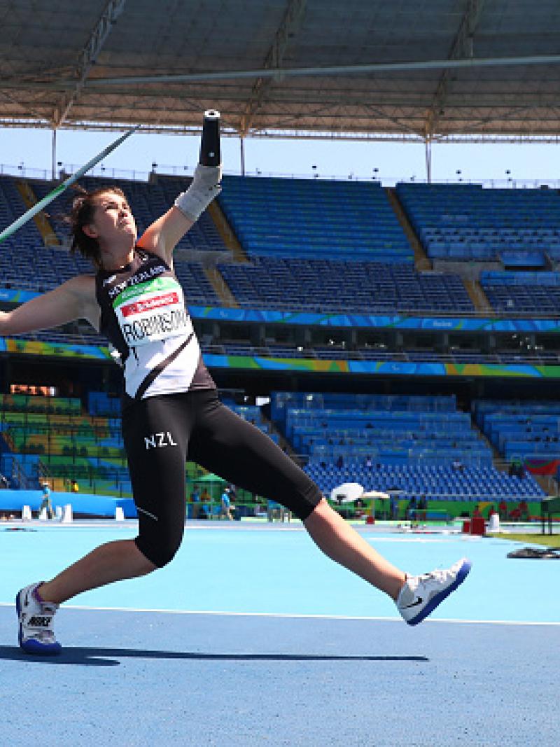 Woman throws a javelin 