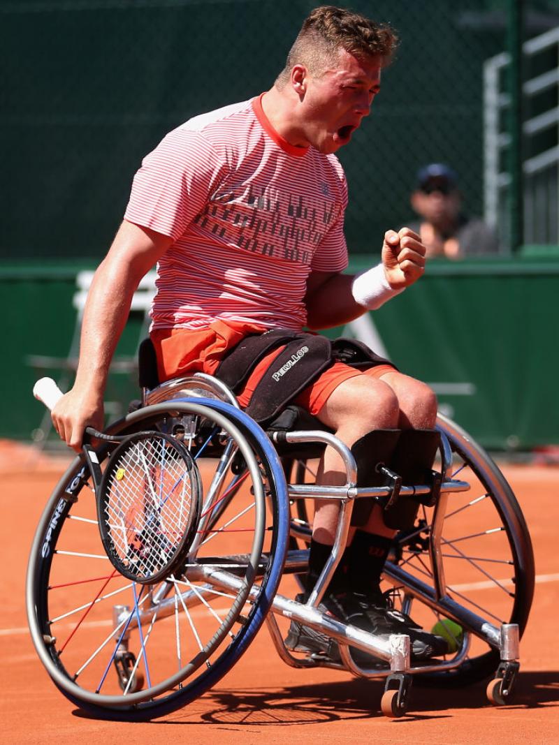 Alfie Hewett of Great Britain celebrates beating Argentina's Gustavo Fernandez in the mens singles wheelchair final at Roland Garros.