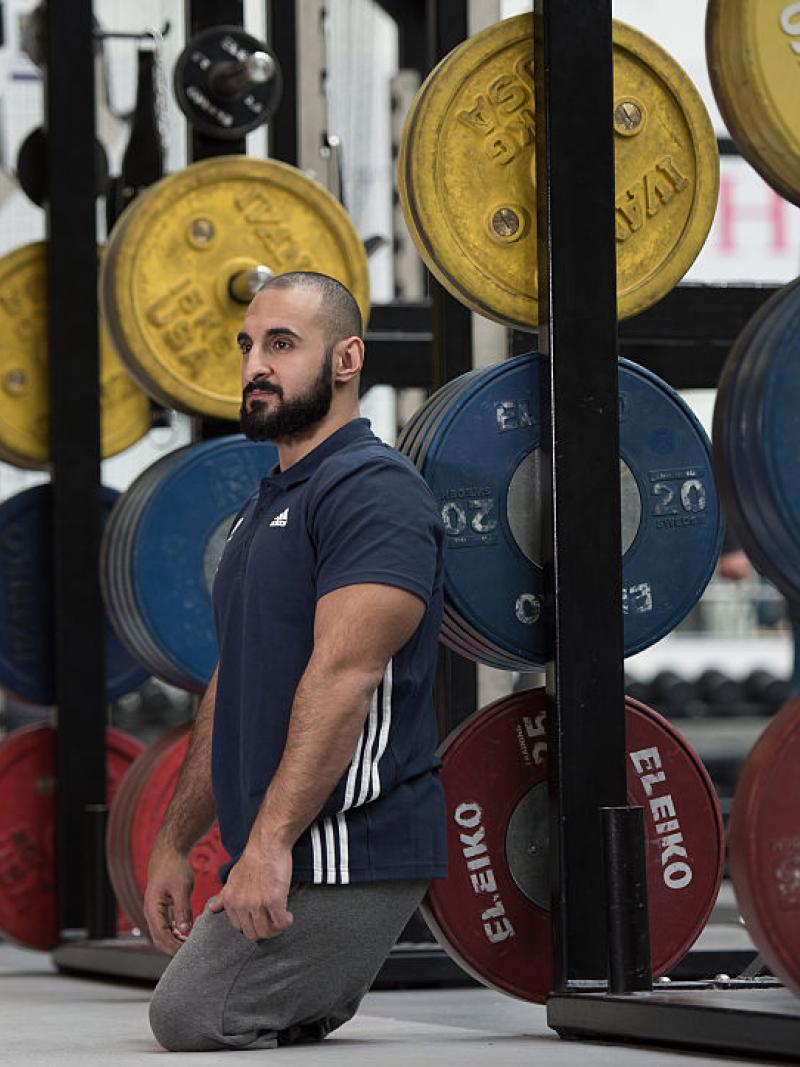 GB powerlifter Ali Jawad poses in weight room at Loughborough University