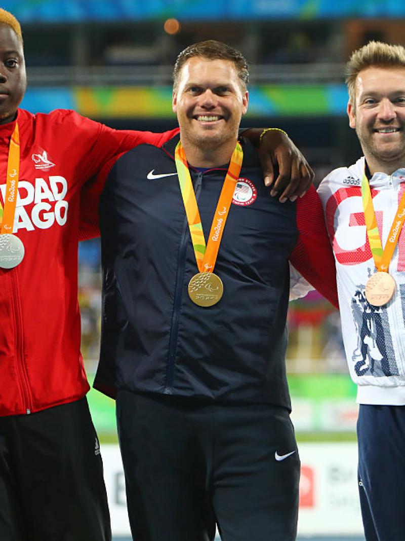 man throws discus