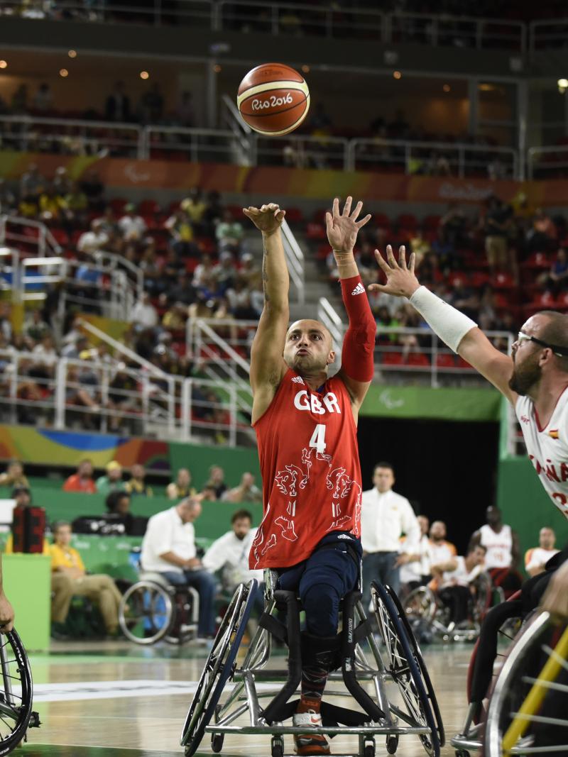 wheelchair basketball male players fight for the ball