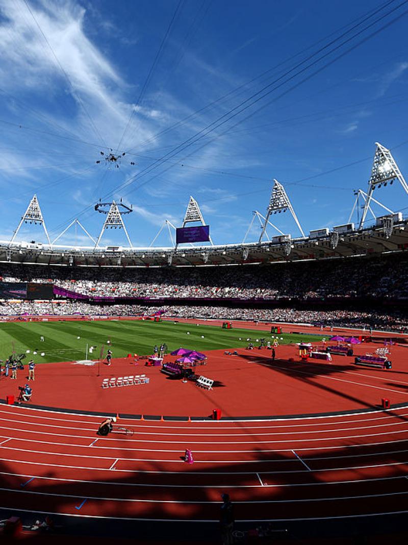 a wide shot of a stadium with fans watching