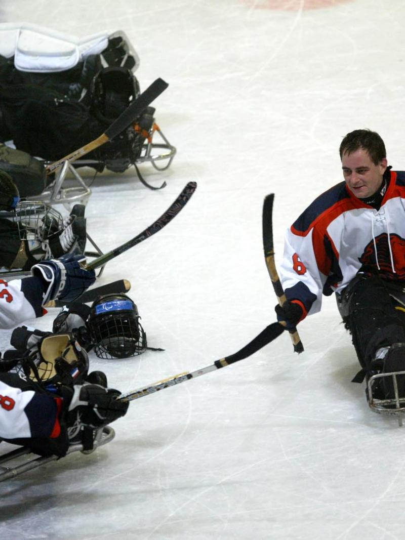 para ice hockey players on the ice