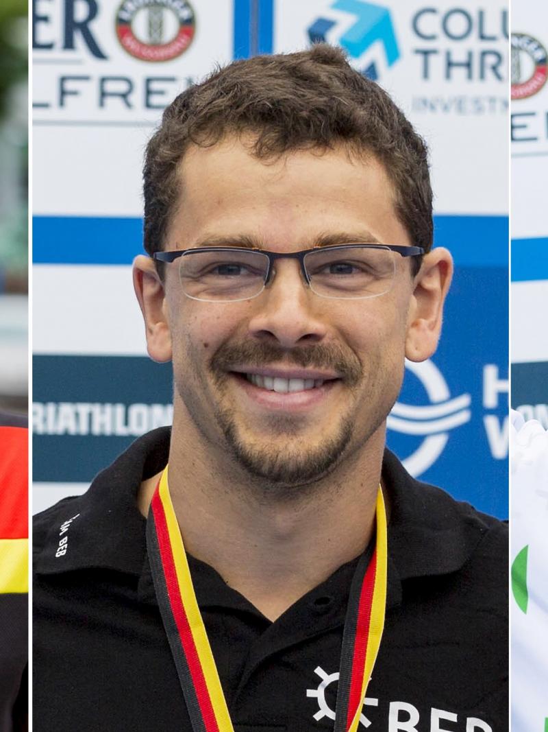 three men smile for the camera
