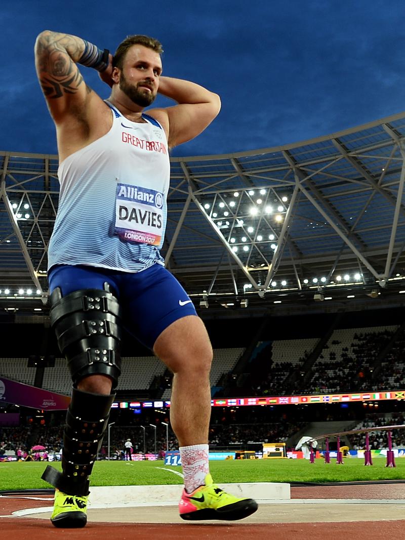 An athlete celebrates winning gold