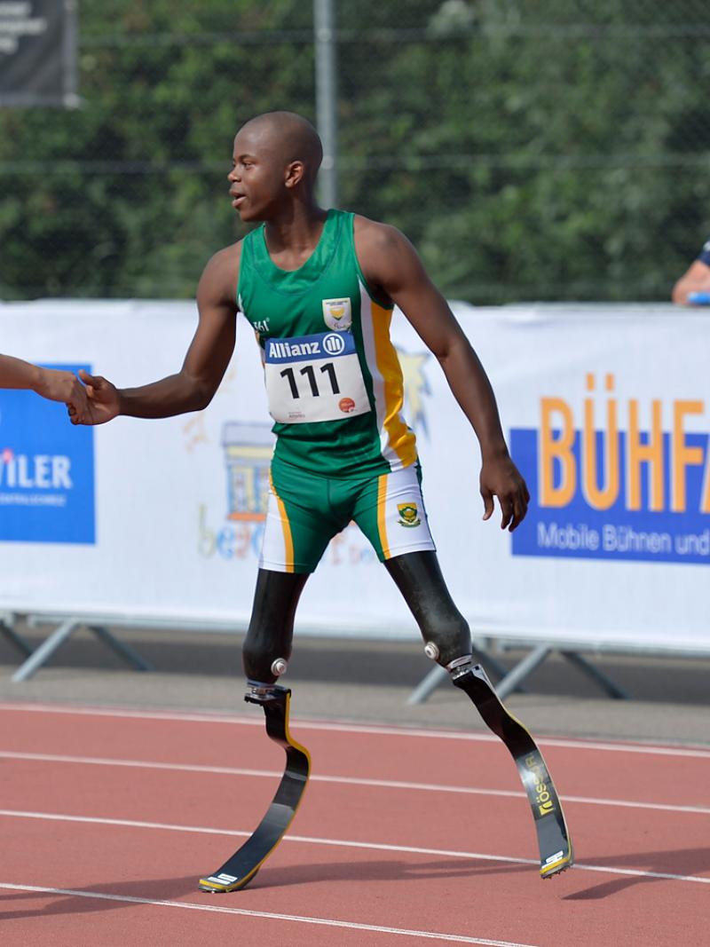 Man in double blades sprints