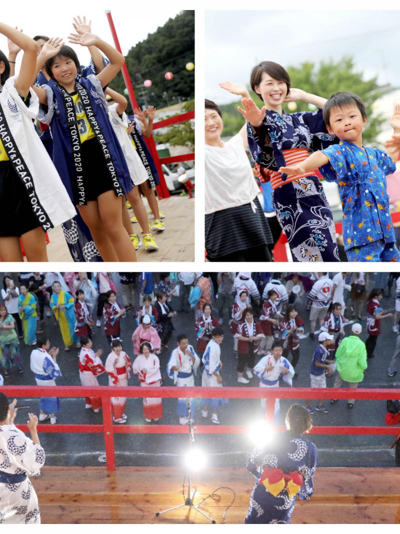 a group of Japanese children dancing in traditional costume