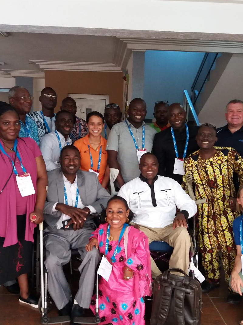 a group of officials smile for the camera