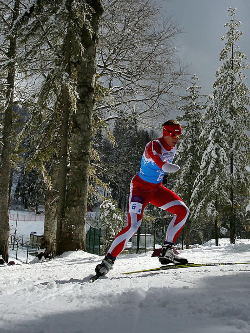 a Para skier moving through the trees