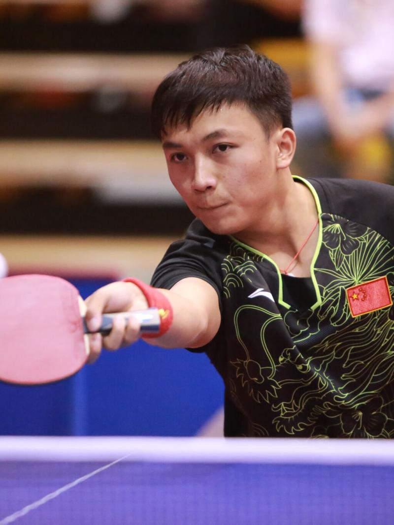 A Para table tennis player takes a shot