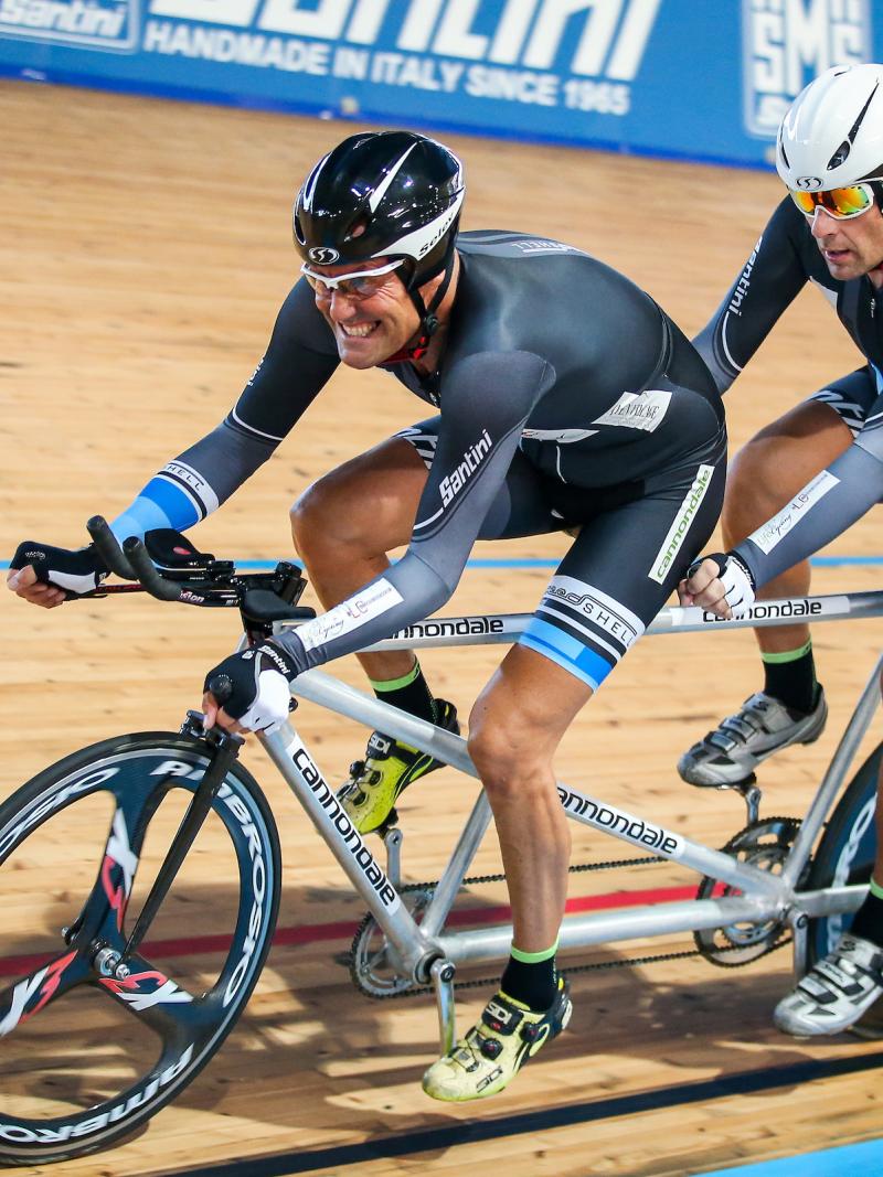 a Para cycling tandem go round the track