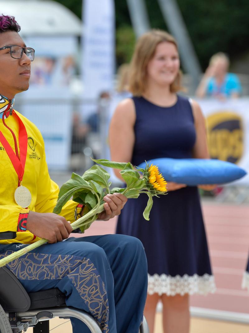 a male Para athlete during a medal ceremony