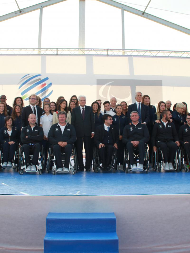 a group of people smile for the camera