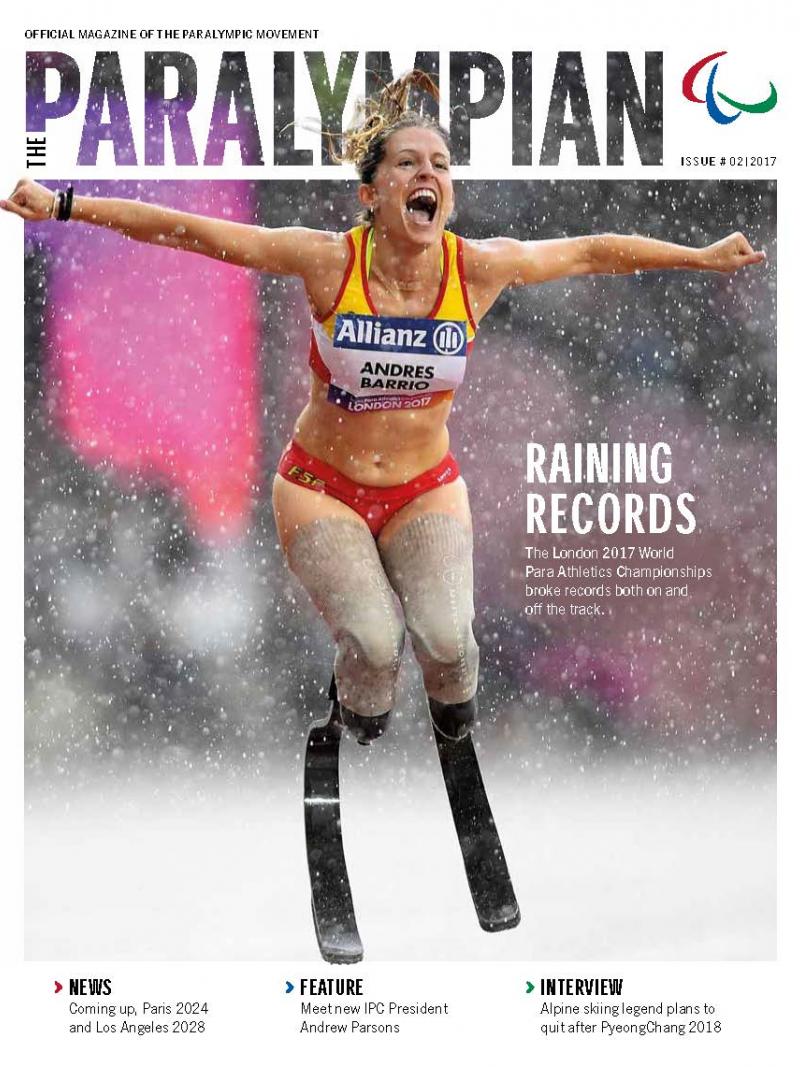 Cover of magazine with female sprinter celebrating in rain