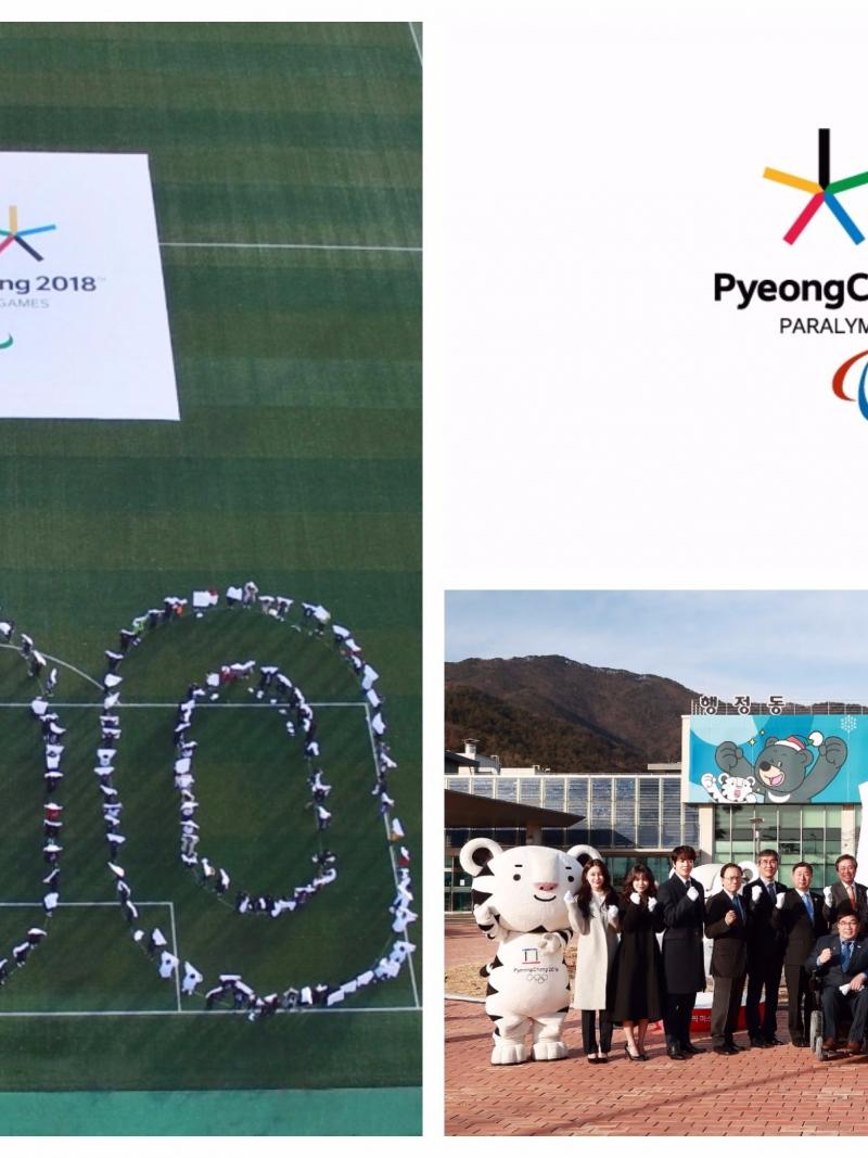 people celebrating with a logo of 100 days to go