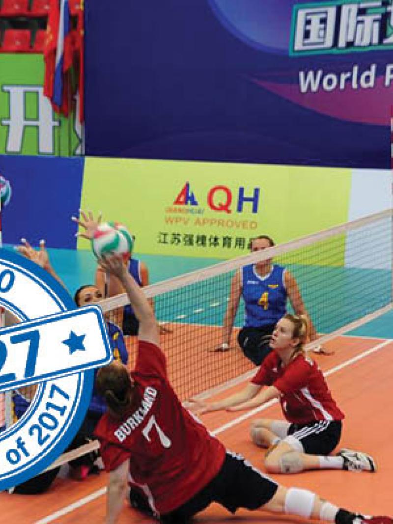 female sitting volleyball players in action on the court