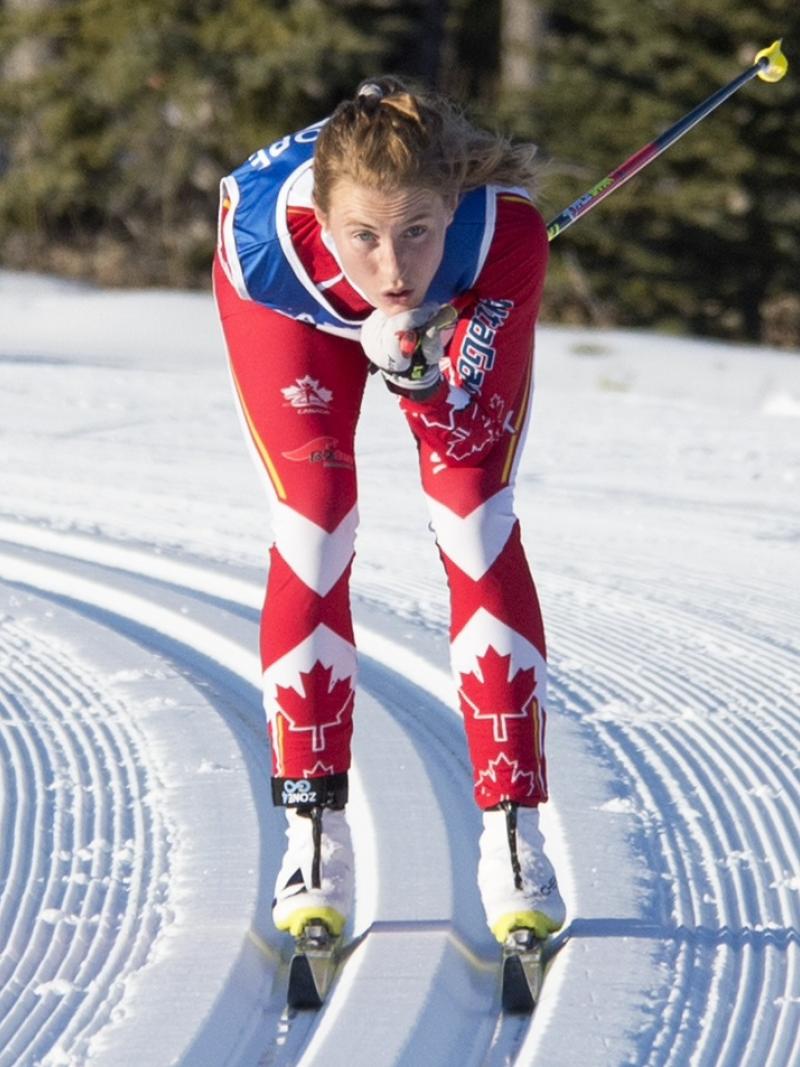 a female Para Nordic skier on the snow