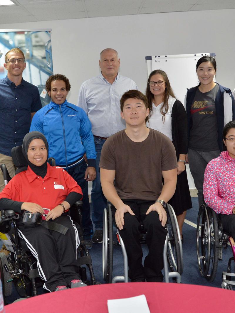 Seven new Proud Paralympian leaders pose with the workshop educators in Dubai