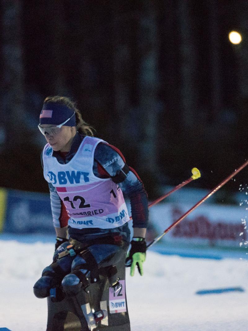 a female sit skier on the snow