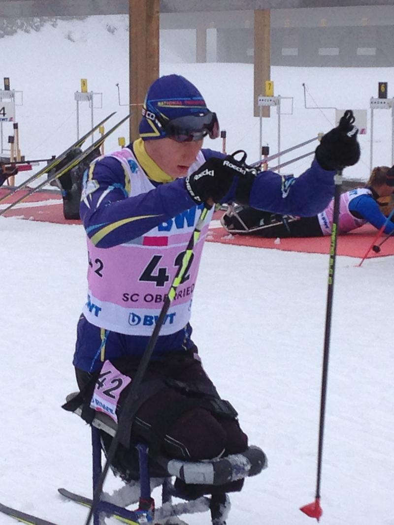 Athlete on a sit skiing racing
