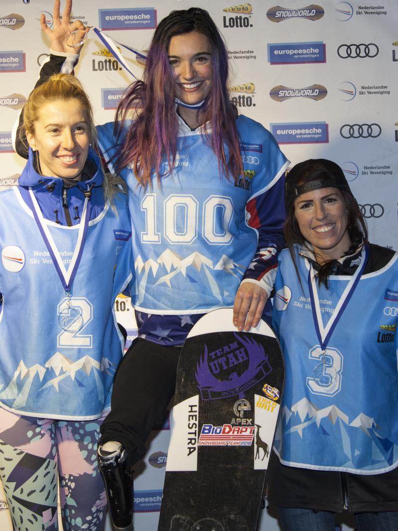 three female Para snowboarders on the podium