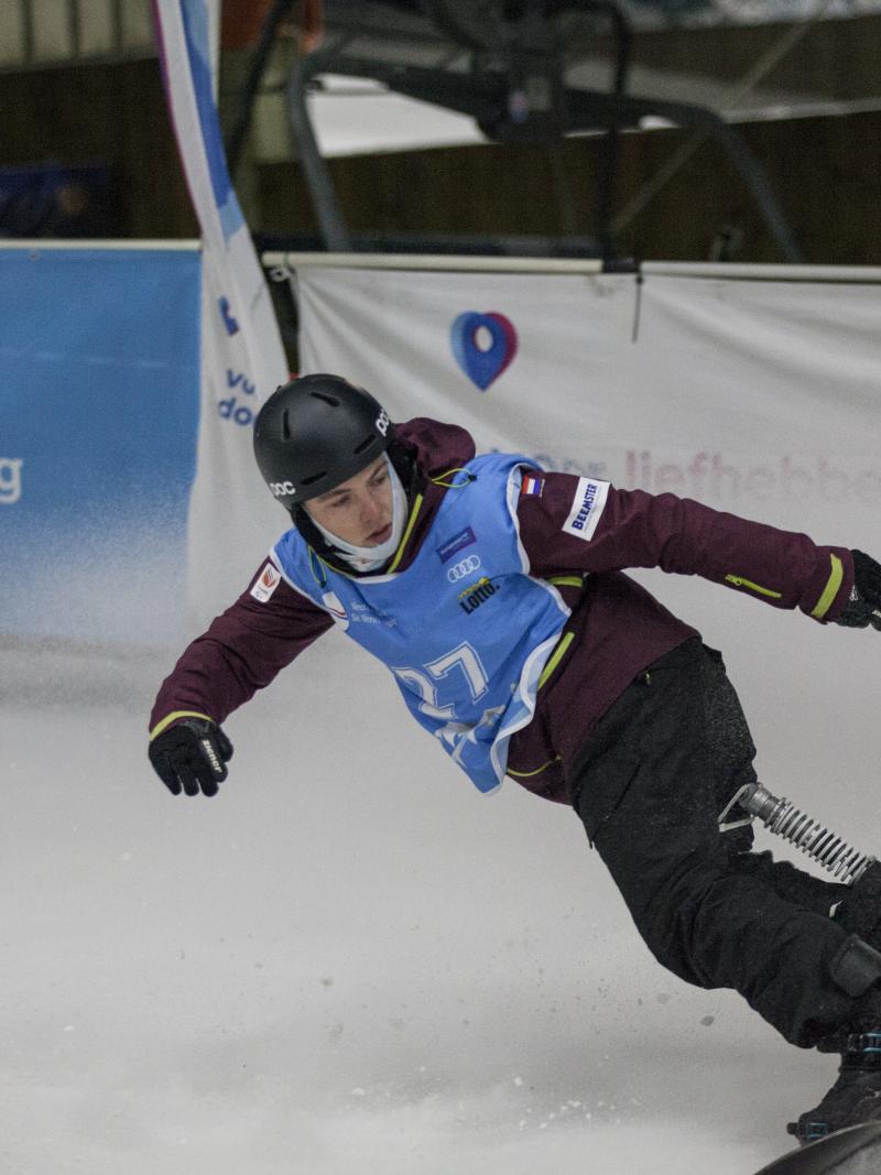 a male Para snowboarder 