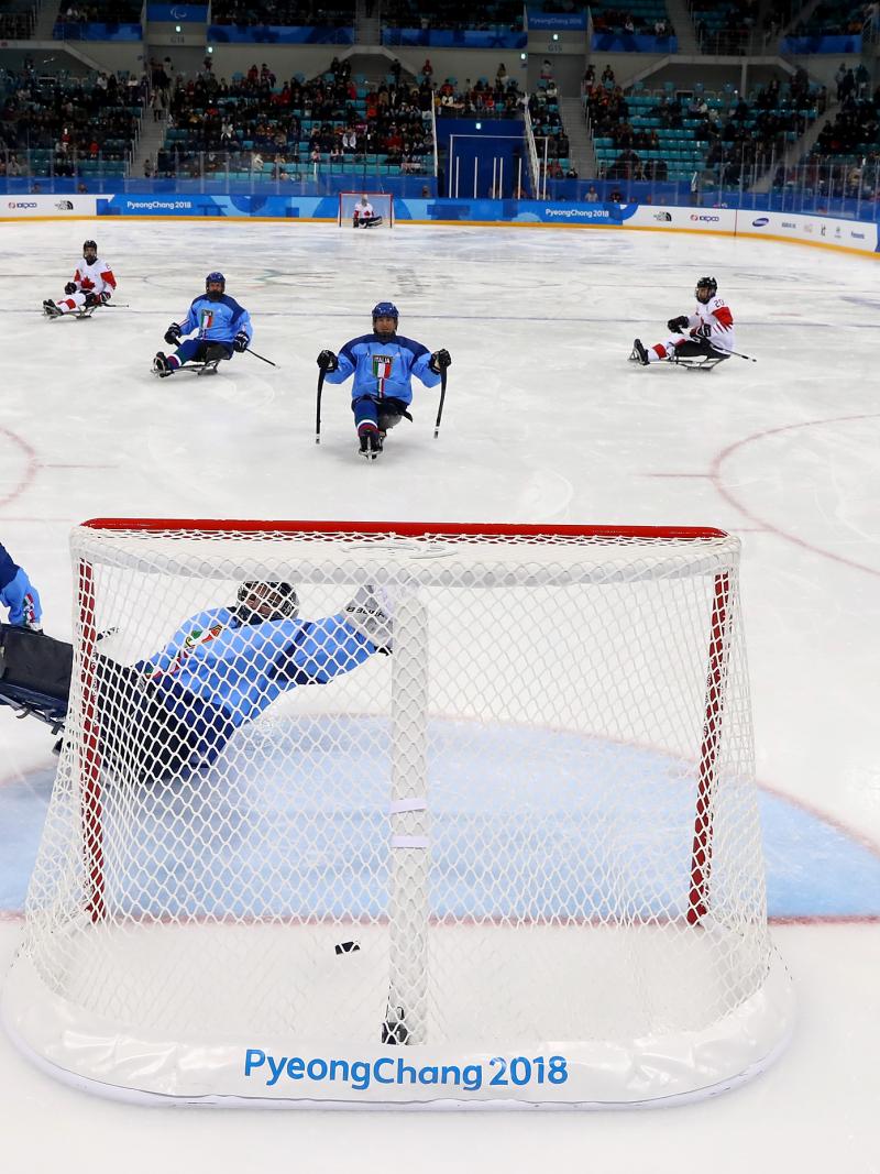 a Para ice hockey scores a goal