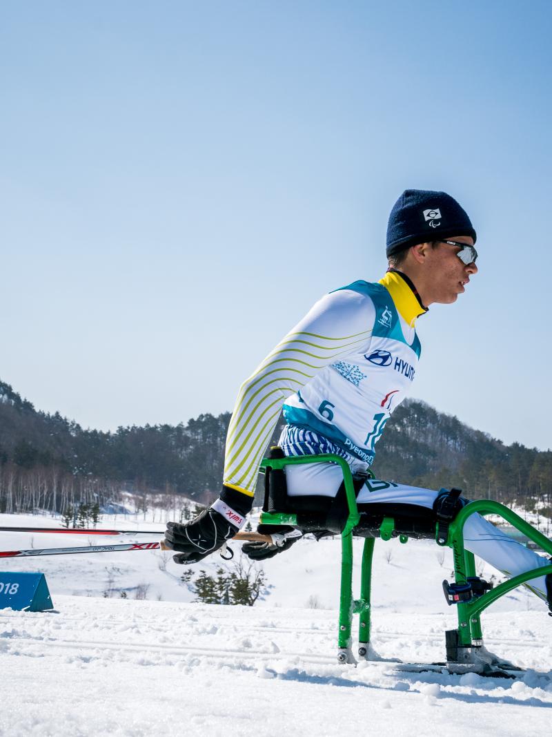 a male Nordic sit skier
