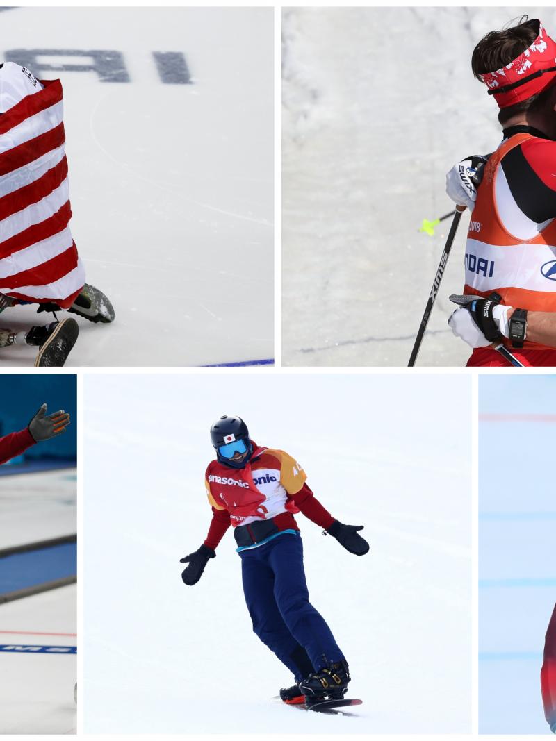 five male Para athletes celebrating medal success