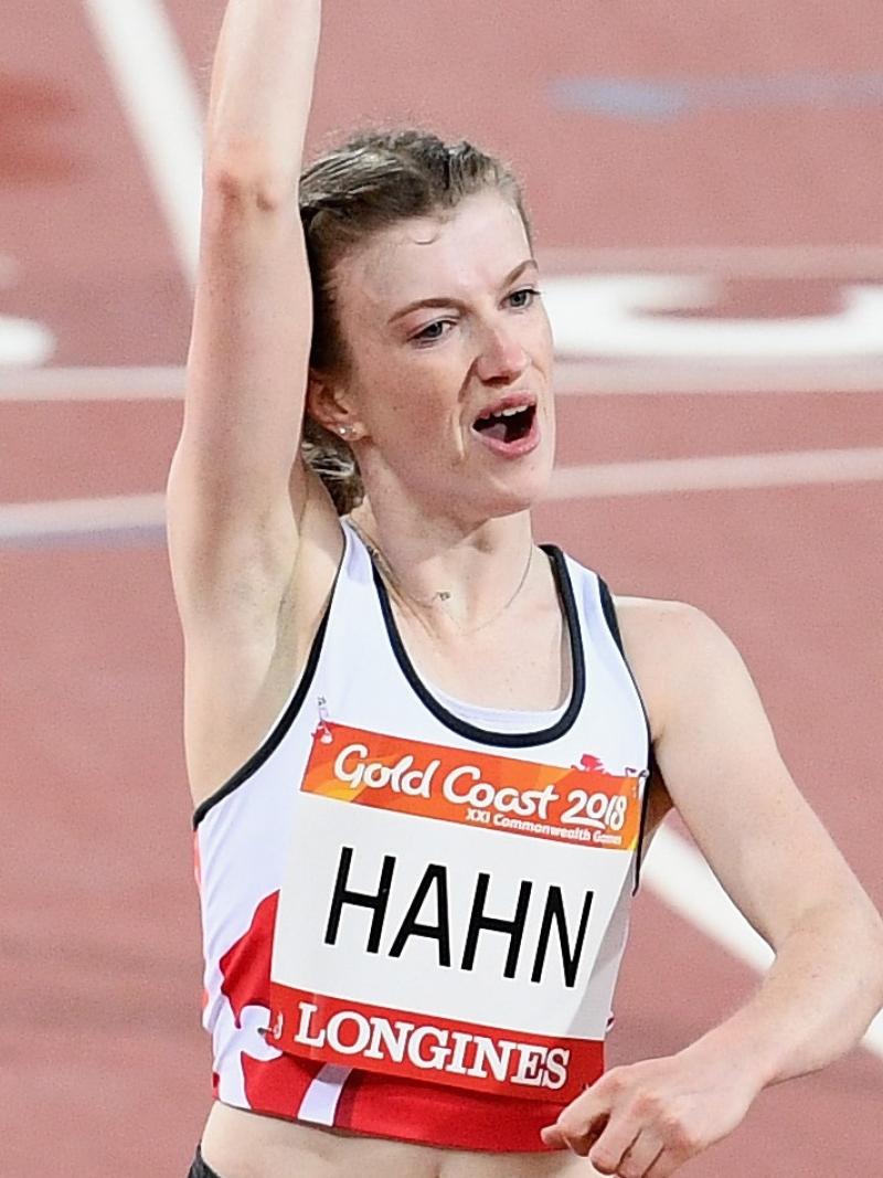 a female Para sprinter punches the air