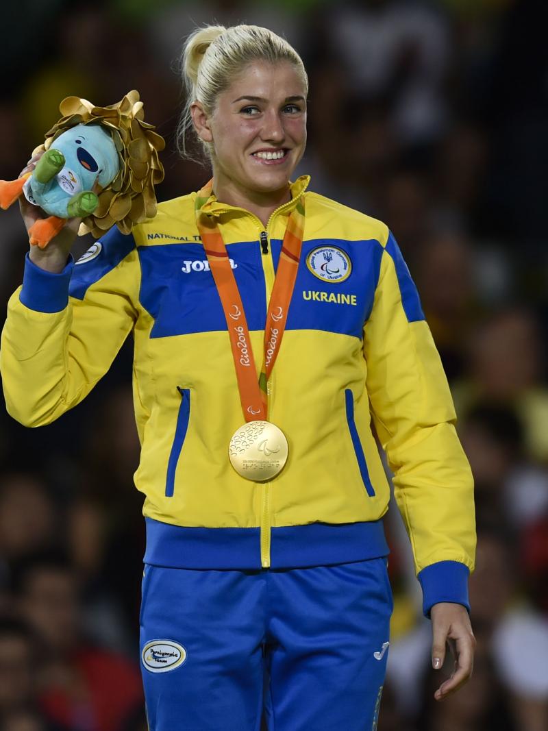 Ukrainian judoka Inna Cherniak celebrates on the podium after winning gold at Rio 2016