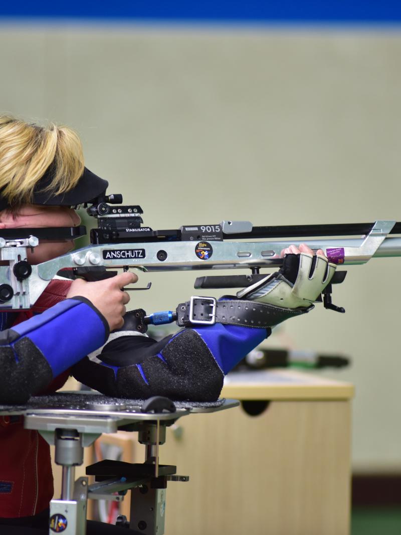a female Para shooter taking a shot