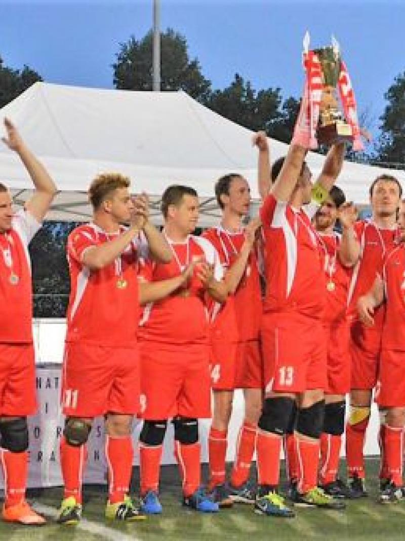 Poland's blind football team celebrates after winning the 2018 Euro Challenge title