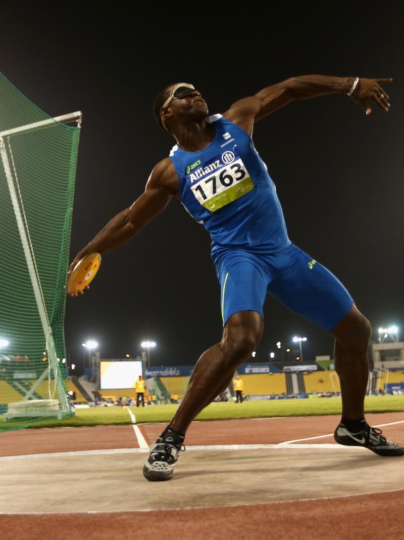 a male discus thrower in action