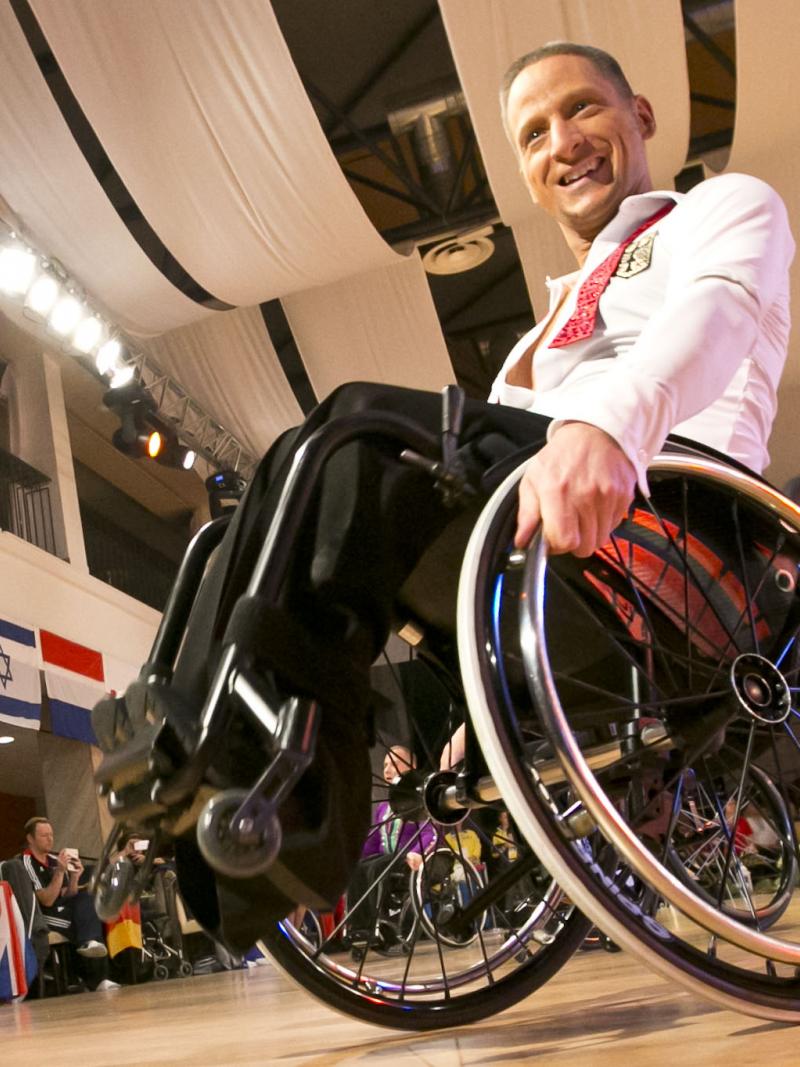 Man in wheelchair dancing