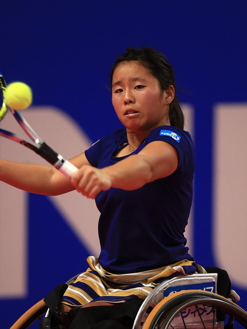 a female wheelchair tennis player