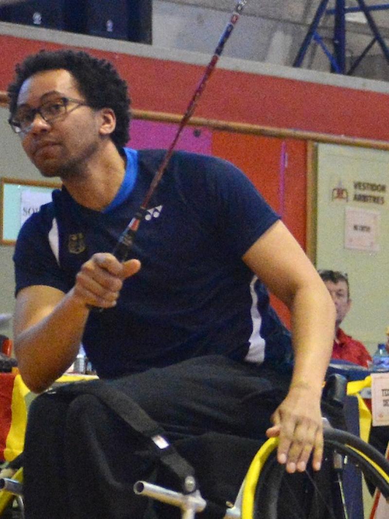 a male Para badminton player in action