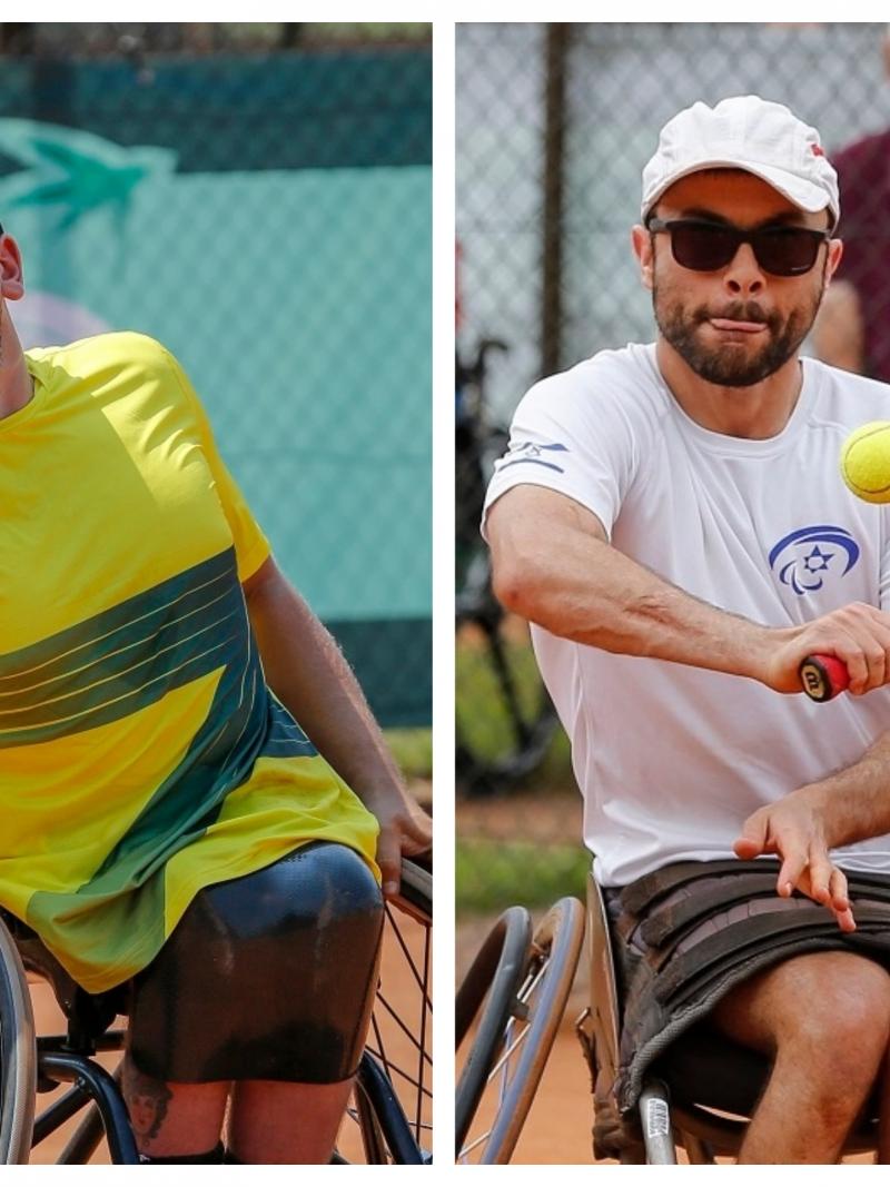 two male wheelchair tennis players in action