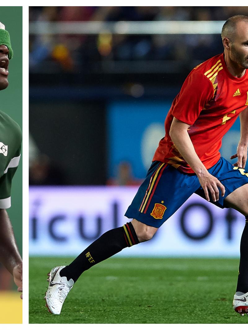a male blind footballer and a male able-bodied footballer on the pitch