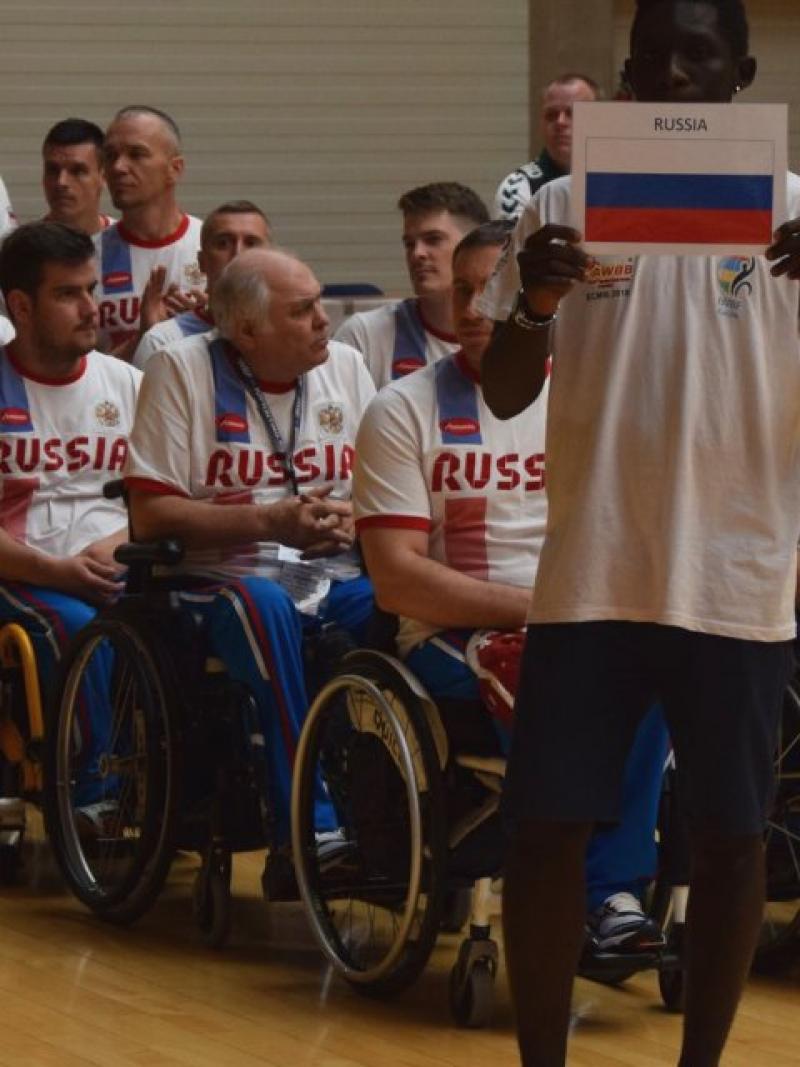 a group of male wheelchair basketball players